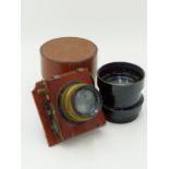 A THORNTON PICKARD MECHANICAL SHUTTER FOR 1/2 PLATE CAMERA FITTED WITH ROSS 71/4In XPRES 1:4.5