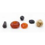 THREE SESSANIAN AGATE SEALS, A STONE SEAL, A HARD STONE CYLINDER SEAL AND AN ENGLISH GLASS