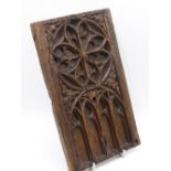 A 16TH/17TH CENTURY CARVED OAK PANEL WITH GOTHIC ARCH DECORATION, A FURTHER SMALL PANEL AND A