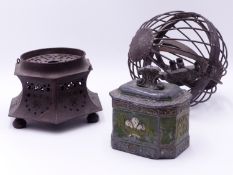 A 19TH CENTURY PIERCED TOLE WARE WARMER, A WROUGHT IRON SHIPS GIMBAL OIL LAMP AND A LEAD TOBACCO