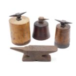 THREE 19TH CENTURY SMALL JEWELLERS ANVILS EACH MOUNTED ON WOODEN BASE TOGETHER WITH A LARGER