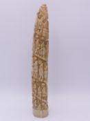 AN ANTIQUE FULLY CARVED IVORY TUSK DEPICTING NATIVE FIGURES ASCENDING IN SPIRAL.19TH CENTURY. LOANGO