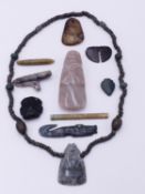 TEN VARIOUS PRE-COLUMBIAN AND OTHER JADE & HARDSTONE PENDANTS TO INCLUDE A CELT WITH AXE GOD