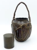 A FINELY MADE JAPANESE PATINATED AND GILDED BRASS LIDDED CYLINDER BOX. BARK EFFECT DECORATION WITH