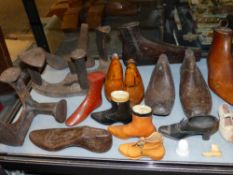 A GROUP OF ANTIQUE AND LATER TREEN AND OTHER SHOE STRETCHERS AND FORMS, COBBLER'S LASTS, ETC ( QTY)