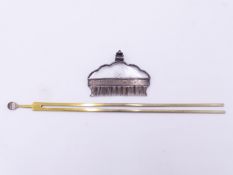 AN ORIENTAL CARVED ROCK CRYSTAL AND SILVER HAIR COMB WITH SUSPENSION LOOP. 6.5 CM WIDE. TOGETHER