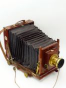 A VICTORIAN THORNTON PICKARD "RUBY" 1/2 PLATE CAMERA, FITTED WITH THORNTON PICKARD MECHANICAL