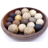 A GROUP OF INTERESTING ANTIQUE GOLF BALLS TO INCLUDE FEATHERY , GUTTY BRAMBLES & MESH EXAMPLES