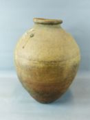 A LARGE CHINESE POTTERY GRAIN JAR. 65 CM HIGH