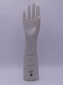 A VINTAGE WHITE GLAZED CERAMIC GLOVE MOULD BY OYEHENART VICHY. 43.5 CM TALL