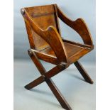 A GOOD 19TH CENTURY FRUIT WOOD GLASTONBURY ARMCHAIR WITH X FORM SUPPORTS.