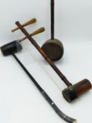 A CHINESE ERHU STRINGED INSTRUMENT OF BAMBOO AND SNAKESKIN CONSTRUCTION, ANOTHER SIMILAR AND A THIRD