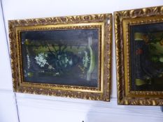 20TH CENTURY SCHOOL. A PAIR OF FLORAL STILL LIVES. OIL ON CANVAS. 76 X 52CM. ELABORATE GILT FRAMES