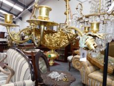 A VINTAGE GILT BRASS GOTHIC REVIVAL STYLE CHANDELIER, THREE DOWN LIGHTS AND SIX CANDLE ARMS