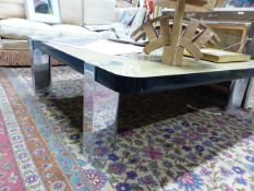 A LARGE DESIGNER CHROME FRAMED COFFEE TABLE