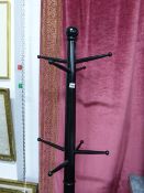 AN EBONISED HATSTAND