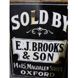 AN ENAMEL SIGN: E J BROOKS & SON OXFORD "SOLD BY"