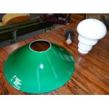 AN UNUSUAL VINTAGE GREEN AND OPAQUE GLASS HANGING LIGHT. DIAMETER OF FLARED SHADE 52CM