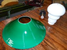 AN UNUSUAL VINTAGE GREEN AND OPAQUE GLASS HANGING LIGHT. DIAMETER OF FLARED SHADE 52CM