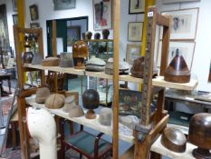 A LARGE COLLECTION OF 19TH AND EARLY 20TH.C. MILLINER'S HAT BLOCKS AND MOULDS