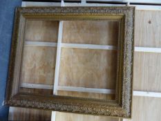 A LARGE ANTIQUE GILT PICTURE FRAME, REBATE 102 X 82CM