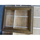 A LARGE ANTIQUE GILT PICTURE FRAME, REBATE 102 X 82CM