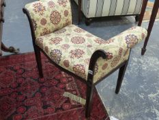 A VICTORIAN UPHOLSTERED CARVED SHOW FRAME DOUBLE END DRESSING STOOL.