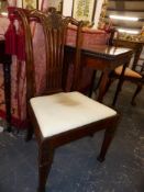 A GEORGIAN MAHOGANY SIDE CHAIR WITH CARVED DECORATION AND ANOTHER ON SHAPED CABRIOLE LEGS.