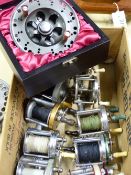 A MATT MAYES LTD EDITION FISHING REEL AND A QUANTITY OF BAIT CASTING REELS