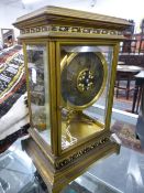 A GOOD VICTORIAN GILT BRASS AND ENAMEL THREE GLASS MANTLE OR DESK CLOCK. SILVERED DIAL, TWO TRAIN