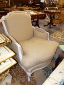 A LARGE FRENCH STYLE PAINTED SHOW FRAME DEEP ARMCHAIR.