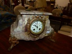 A VICTORIAN MARBLE CASED STRIKING MANTLE CLOCK.