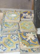 TWELVE MIDDLE EASTERN SQUARE POTTERY TILES. 8.5CM