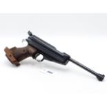 A FEINWERKBAU MOD. 65 TARGET AIR PISTOL IN .177 CALIBRE, ADJUSTABLE GRIP CONTAINED IN A WOODEN