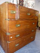 AN ANTIQUE BRASS BOUND CAMPAIGN TWO PART SECRETARY CHEST, THE TOP SECTION WITH FITTED CENTRAL DRAWER