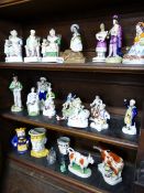 A COLLECTION OF VARIOUS STAFFORDSHIRE POTTERY FIGURINES, TWO COW CREAMERS,ETC