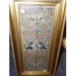 A PAIR OF CHINESE SILKWORK SLEEVE PANELS, FRAMED,