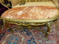 CARVED GILTWOOD MARBLE TOP OVAL LOW TABLE IN THE LOUIS XV STYLE