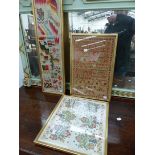 A VICTORIAN NEEDLEWORK SAMPLER, ANOTHER OF SAMPLE DESIGNS AND A N EMBROIDERED BALKAN FLORAL PANEL