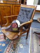 A VICTORIAN OAK DESK CHAIR OF GENEROUS PROPORTIONS.