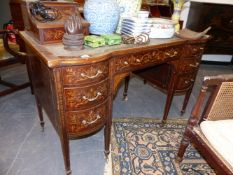 AN EARLY 20TH.C.MAHOGANY AND INLAID WRITING DESK BY EDWARDS & ROBERTS. 120cms WIDE.