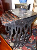 AN ANTIQUE CHINESE EXPORT NEST OF FOUR CARVED AND LAQUERED TABLES