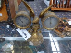 A VICTORIAN GILT BRASS DESK CLOCK AND BAROMETER WITH EAGLE SURMOUNT