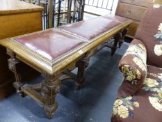 A LARGE 19TH.C.OAK AND LEATHER UPHOLSTERED HALL BENCH. 175cms LONG.