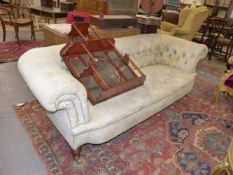 A VICTORIAN LOW BUTTON BACK UPHOLSTERED CHESTERFIELD SETTEE. APPROX 205cms WIDE., MAKER HOLLAND &