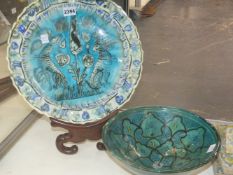 AN ISNIK POTTERY BOWL 'LACHENAL' WITH STAND. 33CM DIAMETER. TOGETHER WITH ANOTHER BOWL. 25CM DIAMETE