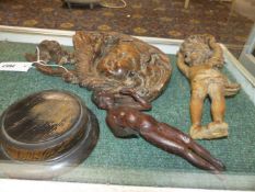 AN ANTIQUE CONTINENTAL CARVED PINE PUTTO MASK, TWO STANDING FIGURES, ETC.