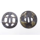 TWO IRON TSUBA, THE FIRST PIERCED AND HIGHLIGHTED WITH GILT, THE SECOND DECORATED WITH A STYLISED