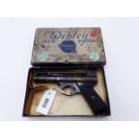 A WEBLEY MARK I AIR PISTOL, IN .22 CALIBRE, SERIAL NO 52677, CONTAINED IN ITS ORIGINAL BOX, THE