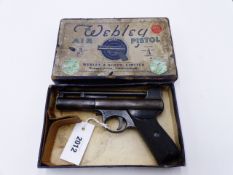 A WEBLEY MARK I AIR PISTOL, IN .22 CALIBRE, SERIAL NO 52677, CONTAINED IN ITS ORIGINAL BOX, THE